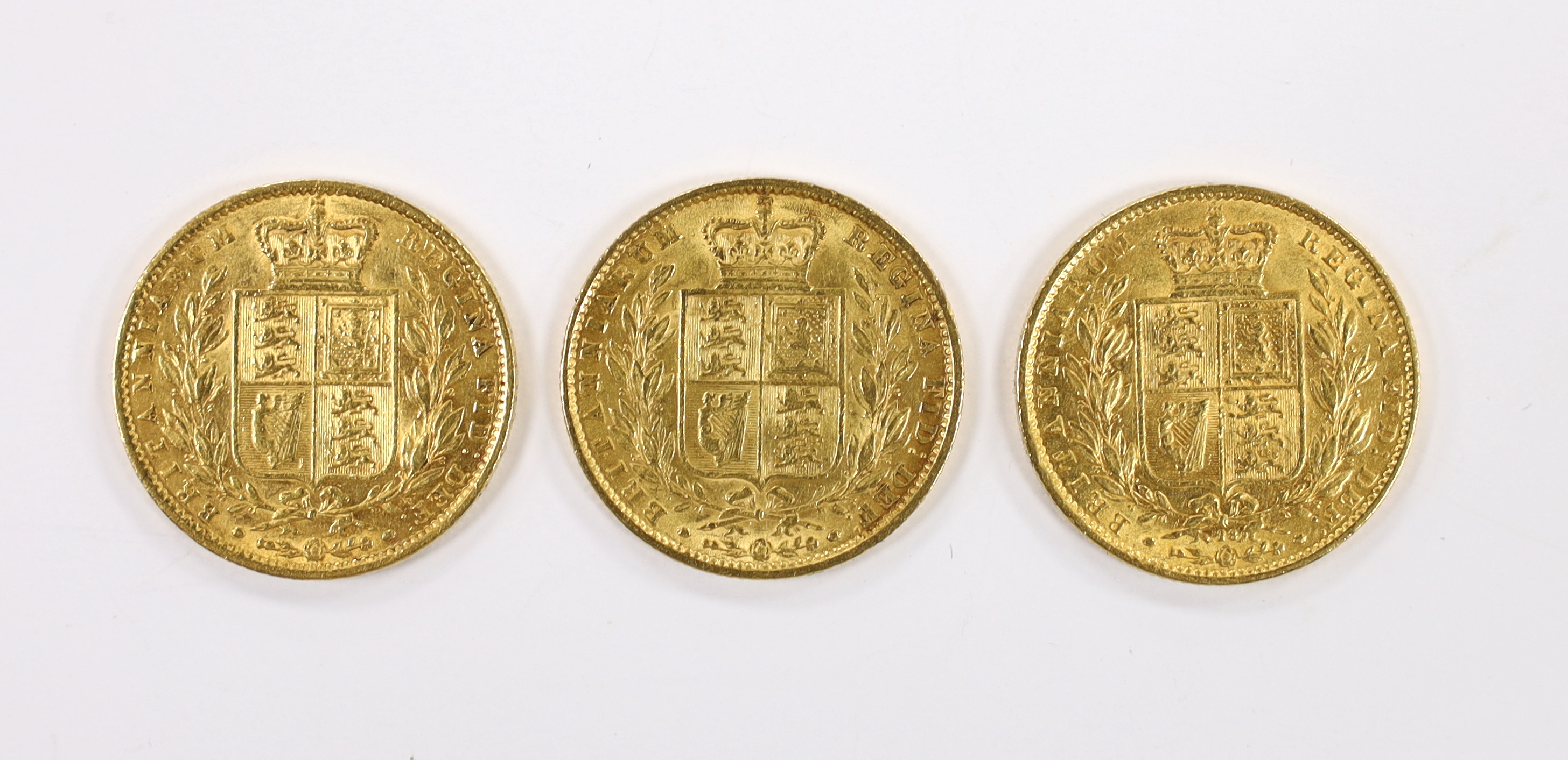 British gold coins, three Victoria gold sovereigns - 1869 die no. 28, about fine, two 1862 wide date, one with die error next to 1 (in 1862), otherwise about fine